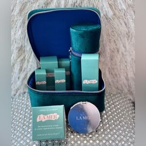 La Mer The Moisturizing Cream 0.5 oz with travel bags and travel products
